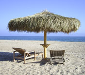 Single Pole Palm Palapa on the Beach